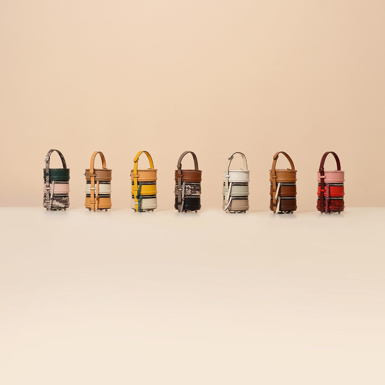#NashaPinto Leather Bag Charm & Mini Bucket Bag in Pinto Lunch box shape with 1 leather handle and 1 leather strap. Pinto Series has 3 sizes, Original, Mini, Baby size. NASHA MADE IN MARS / NASHABAG / กระเป๋า ปิ่นโต