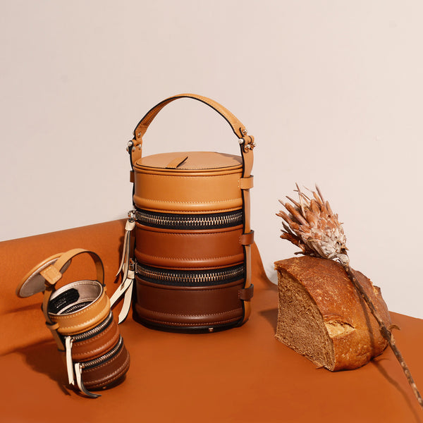 #NashaPinto Leather Bag Charm & Mini Bucket Bag in Pinto Lunch box shape with 1 leather handle and 1 leather strap. Pinto Series has 3 sizes, Original, Mini, Baby size.  NASHA MADE IN MARS / NASHABAG / #NASHAPINTO กระเป๋า ปิ่นโต